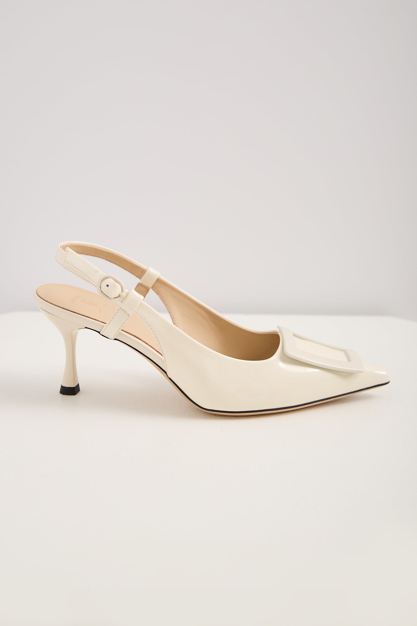 Sling back heel shoe