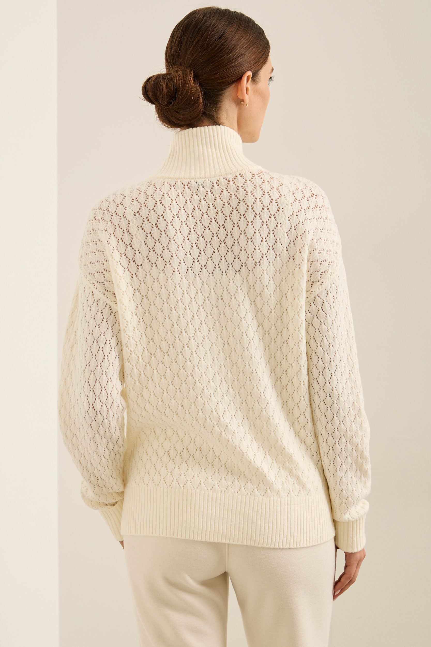 Crew neck pointelle sweater