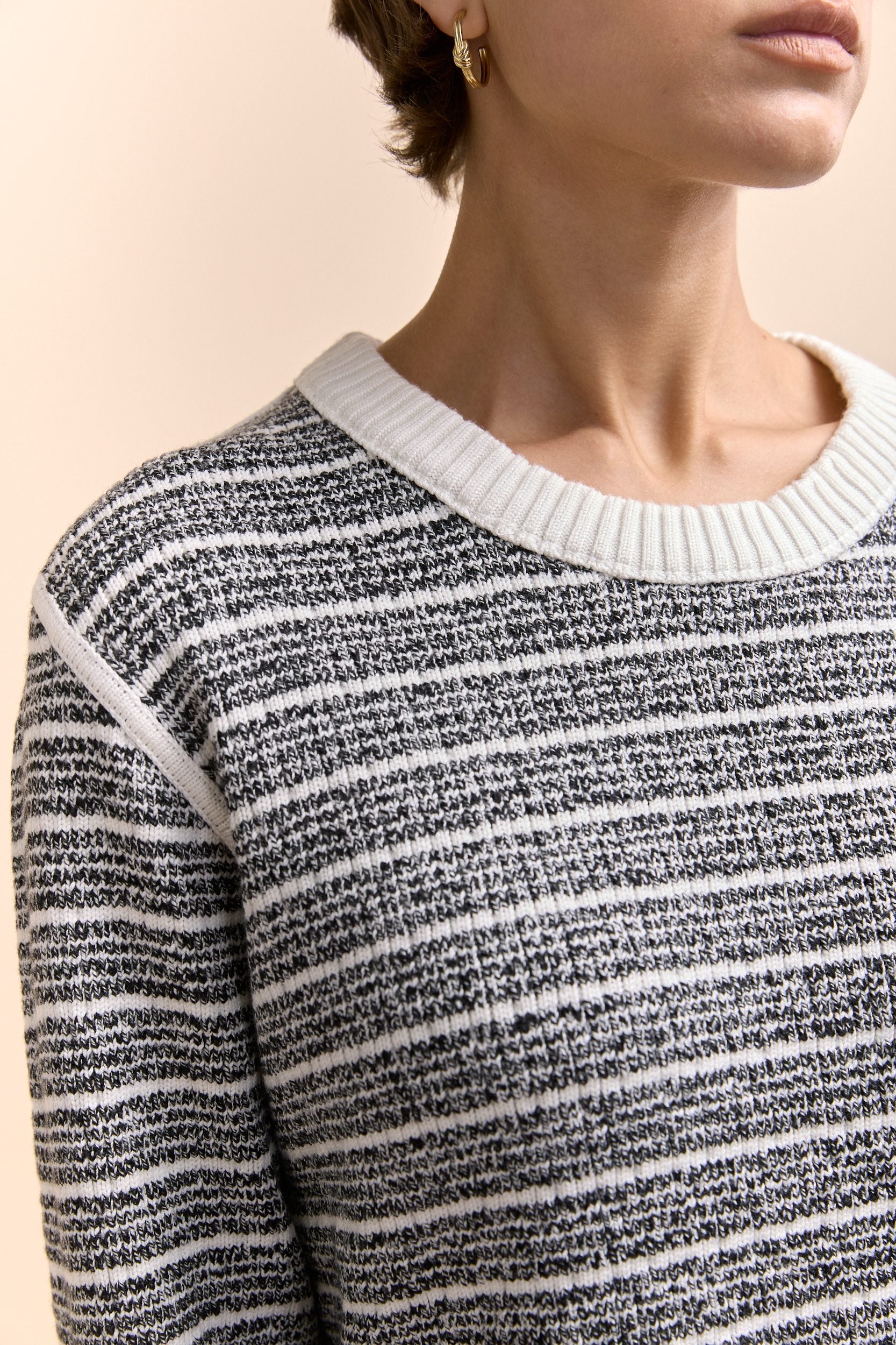 Reversible textured crew neck sweater