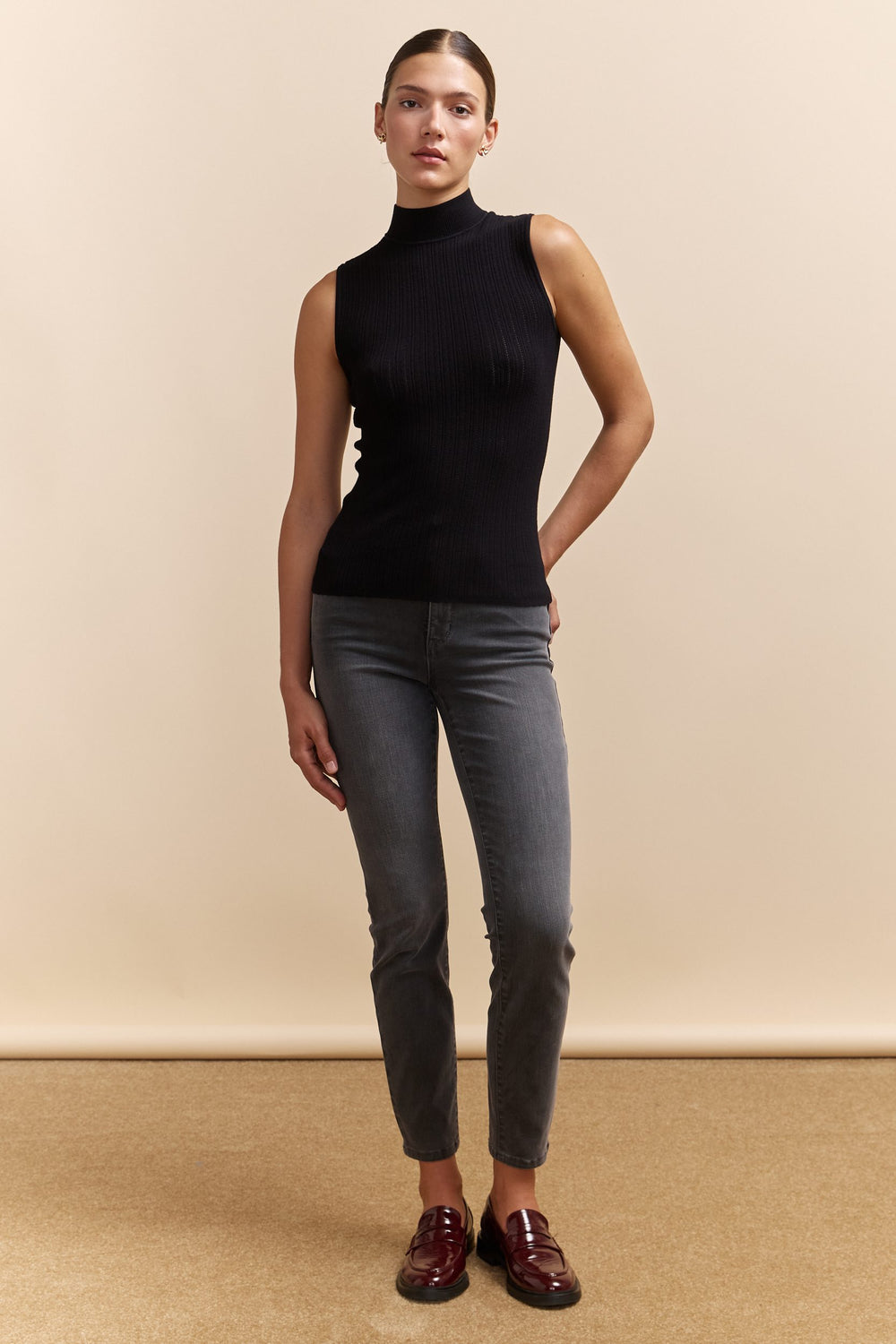 Sleeveless sweater with mock neck