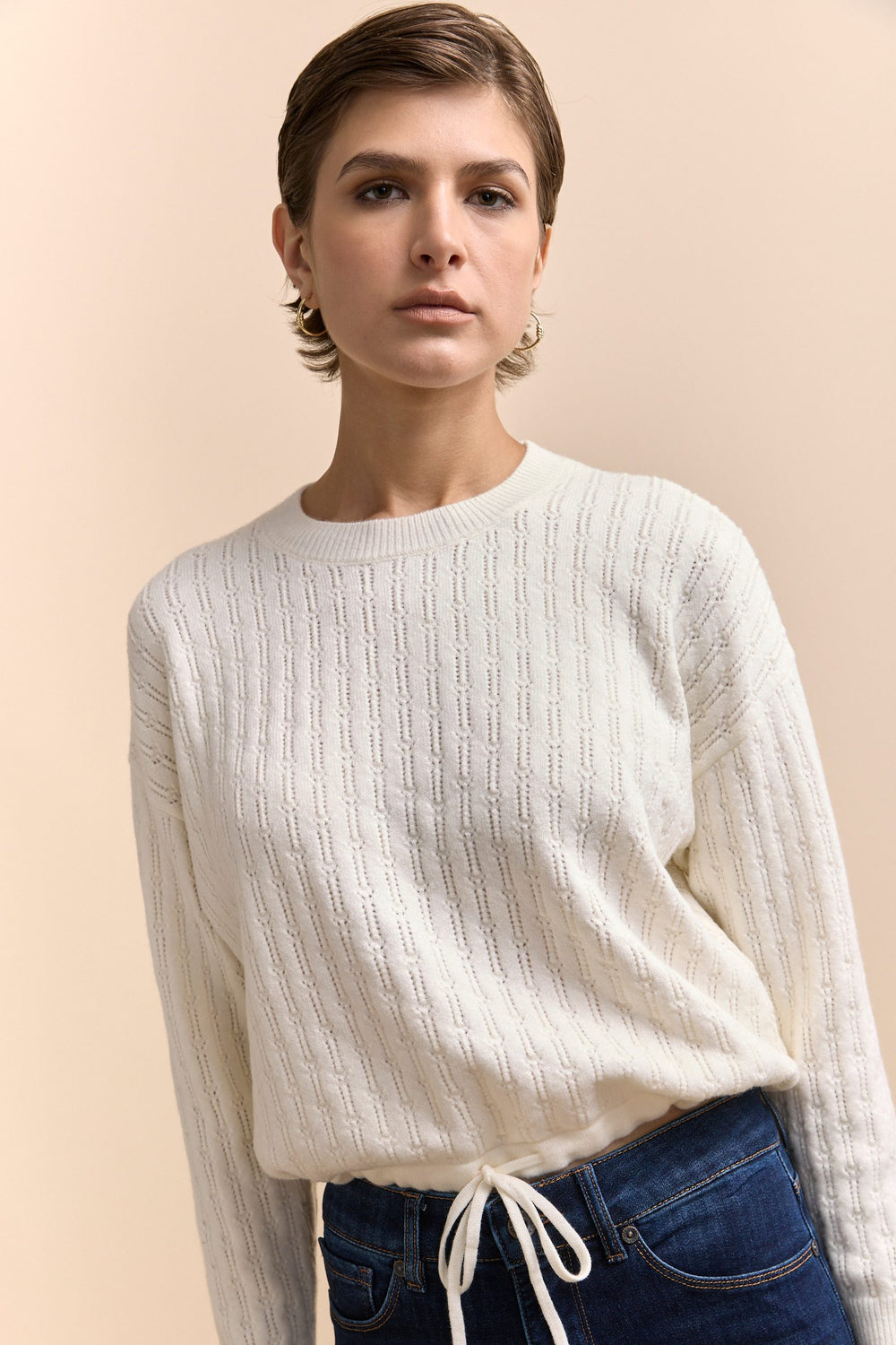 Textured sweater with drawstring