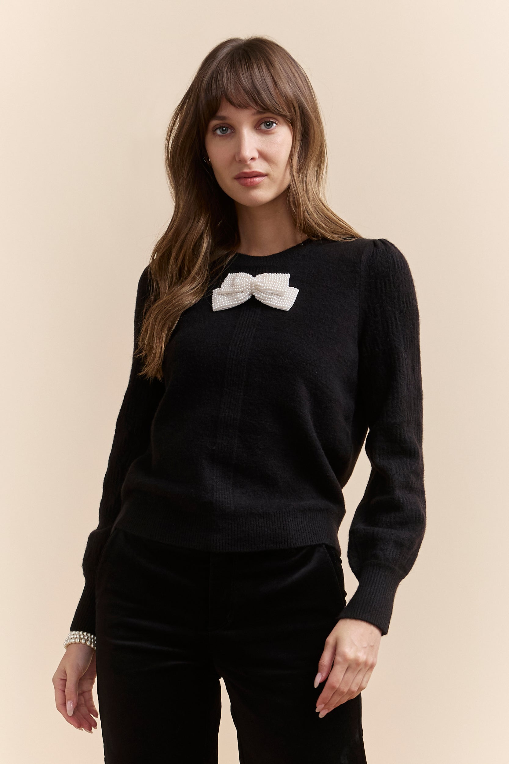 Pull avec boucle en perles