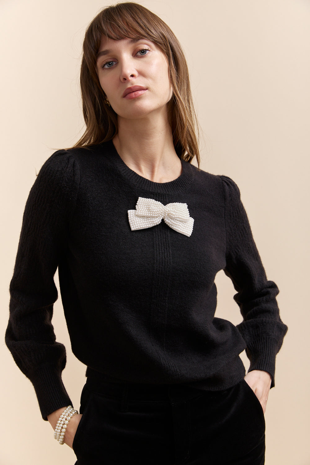 Pull avec boucle en perles