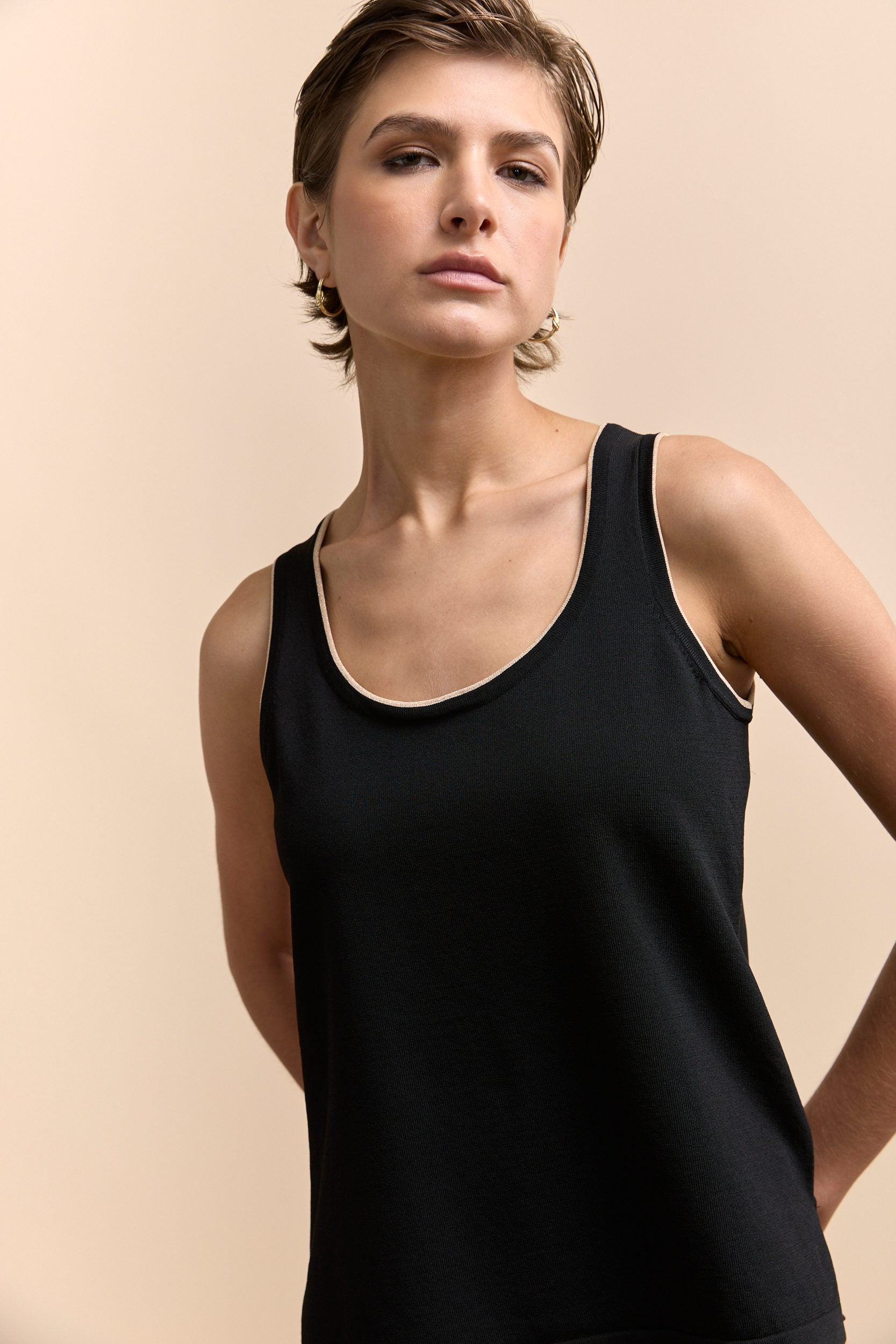 Sleeveless top with sheer back