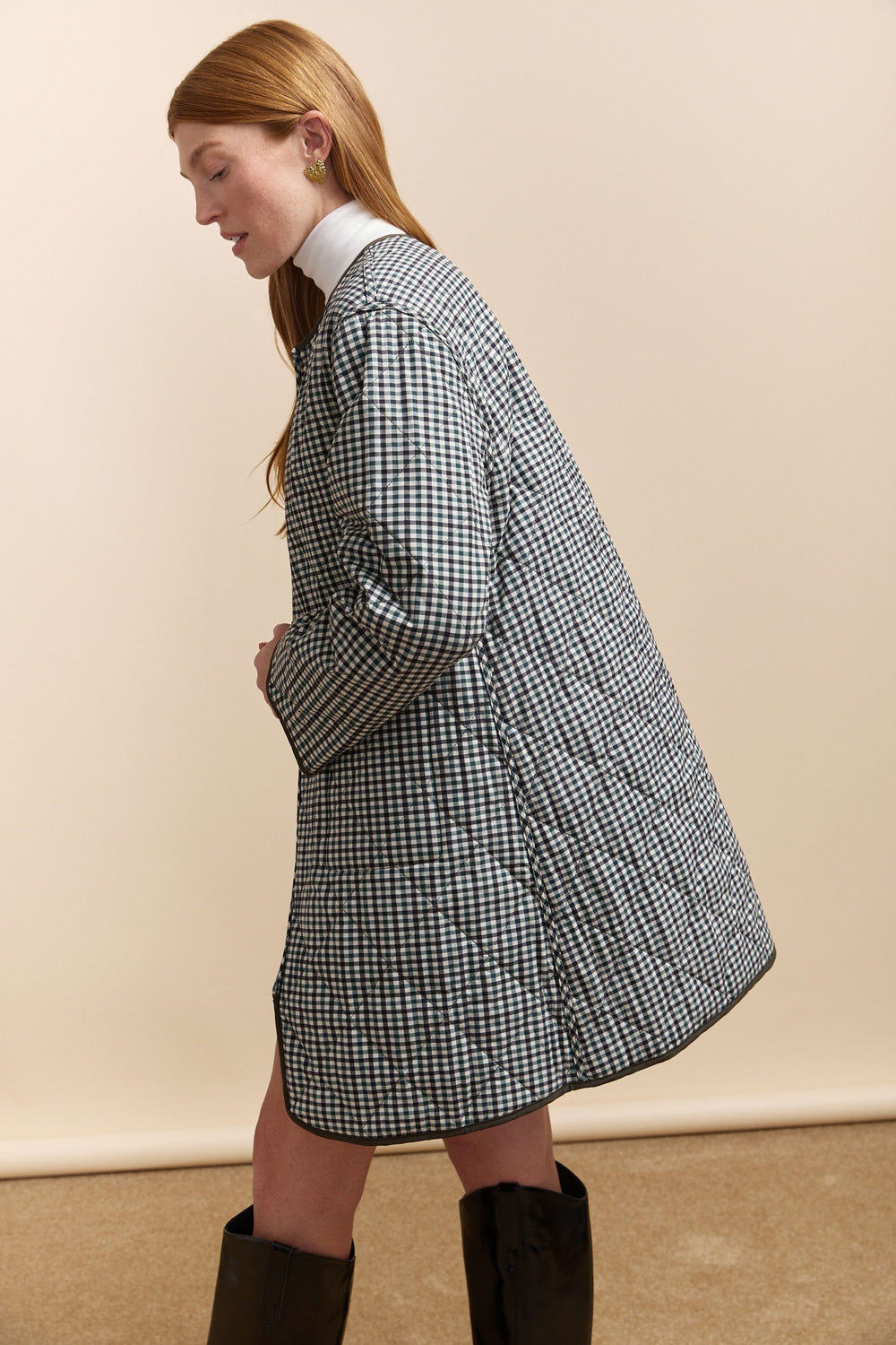 Coat with removable quilted lining