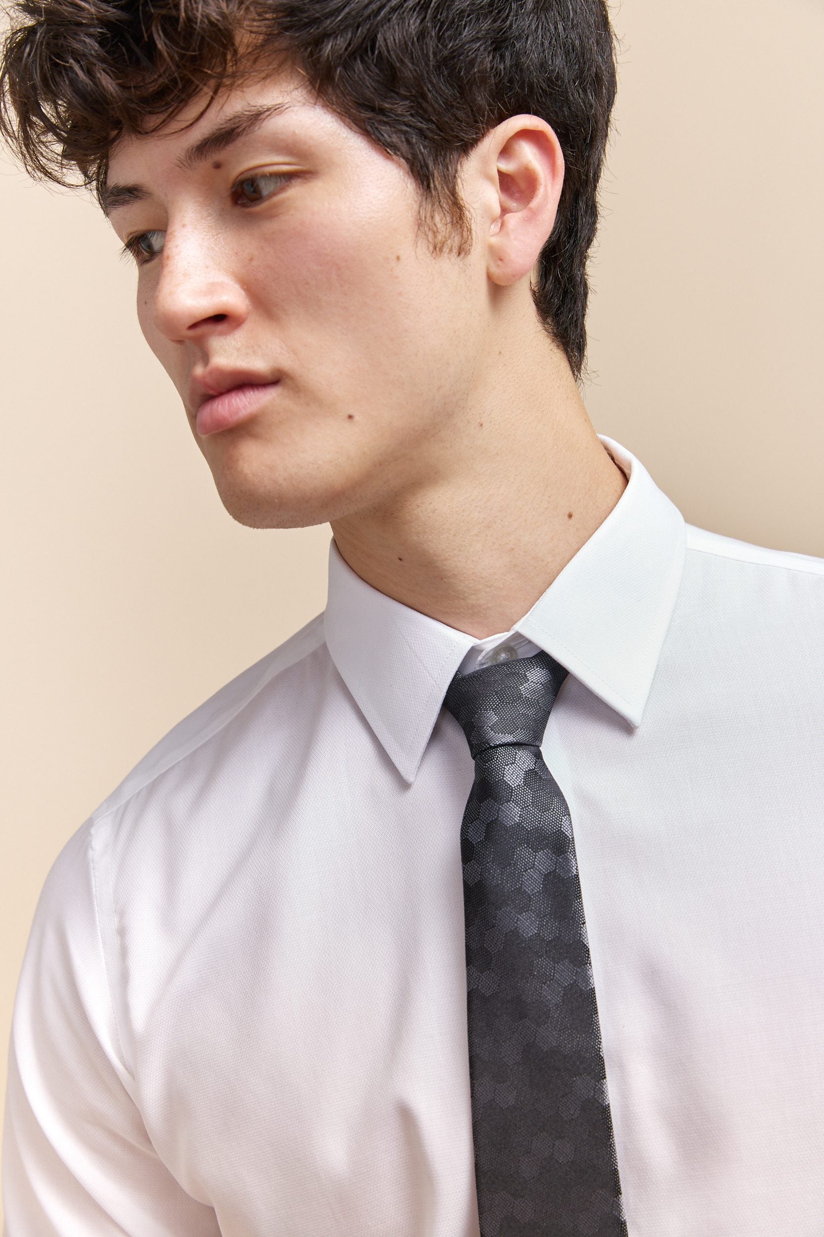 Geometric jacquard tie