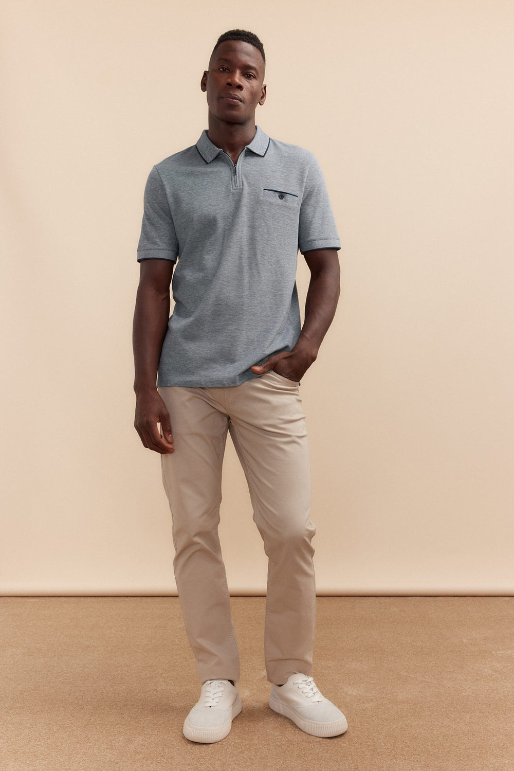 Textured rib zip neck knit polo