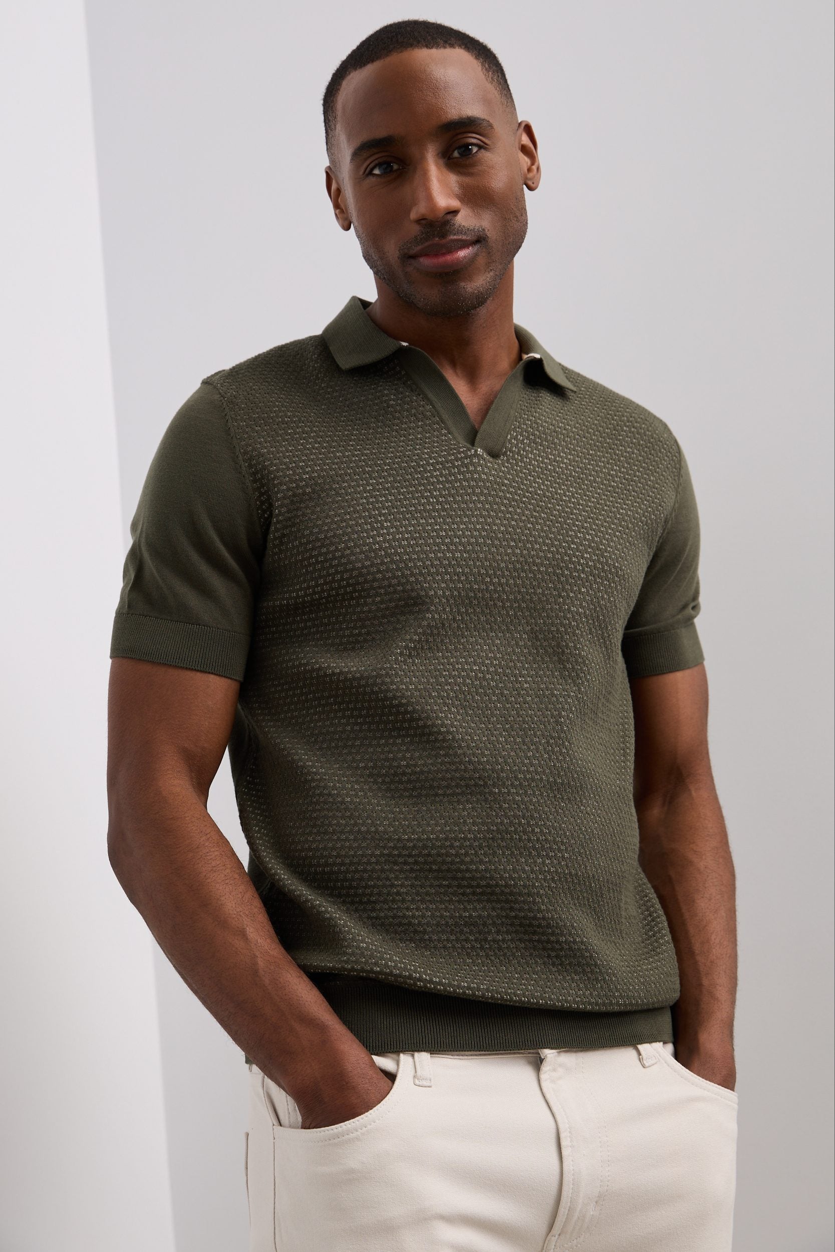 Two-tone pointelle knit polo shirt