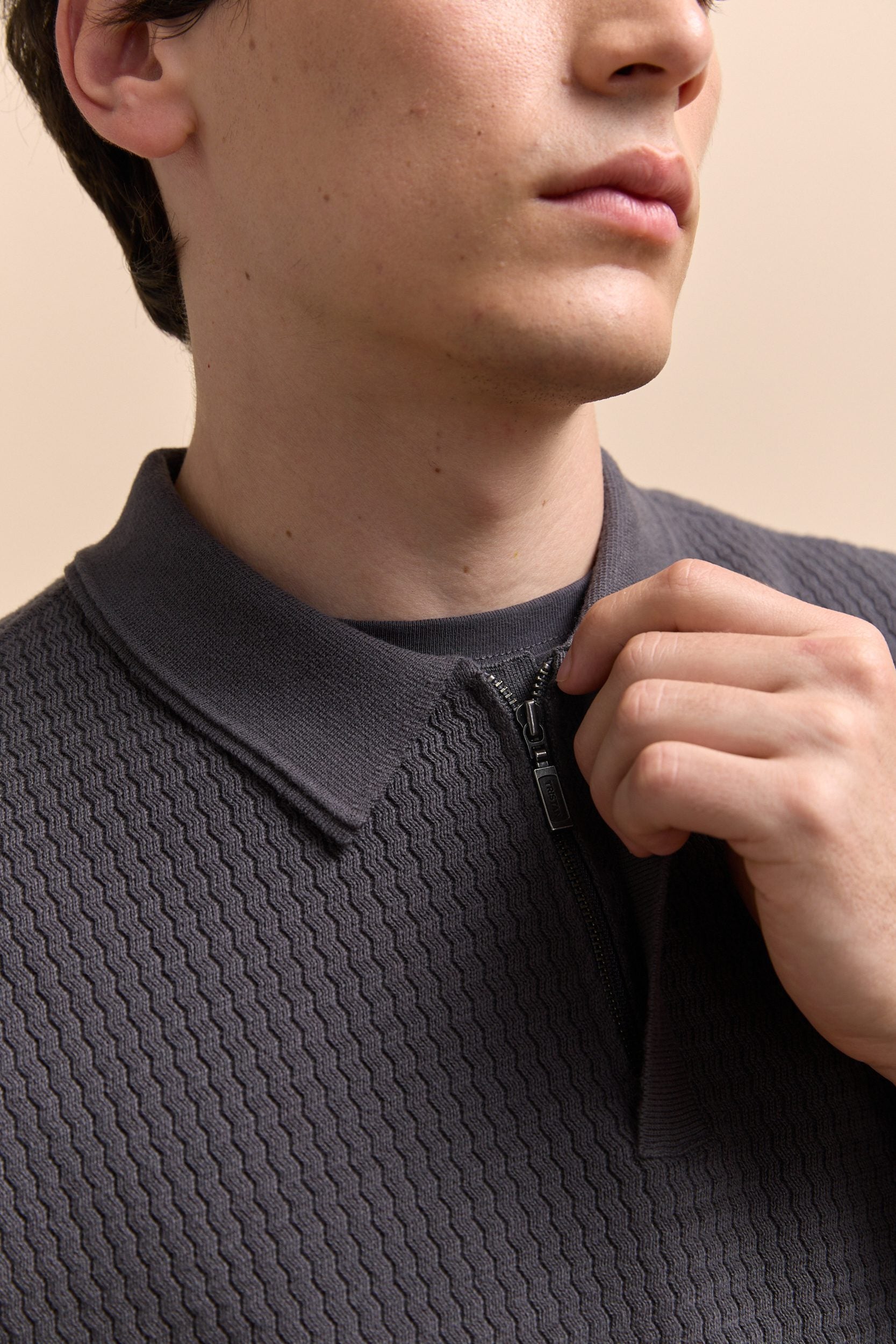 Textured zip polo sweater