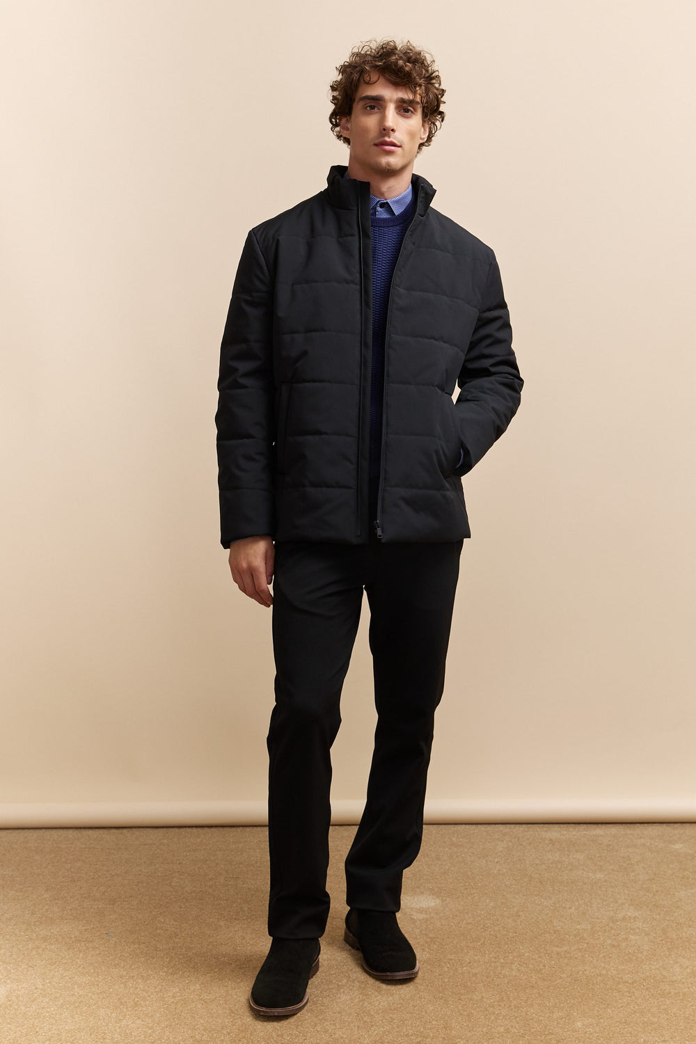 Quilted coat with zip closure