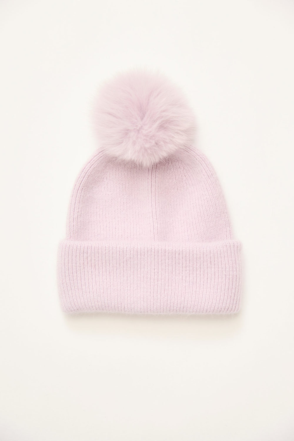 Bonnet en mélange d'angora avec pompon a