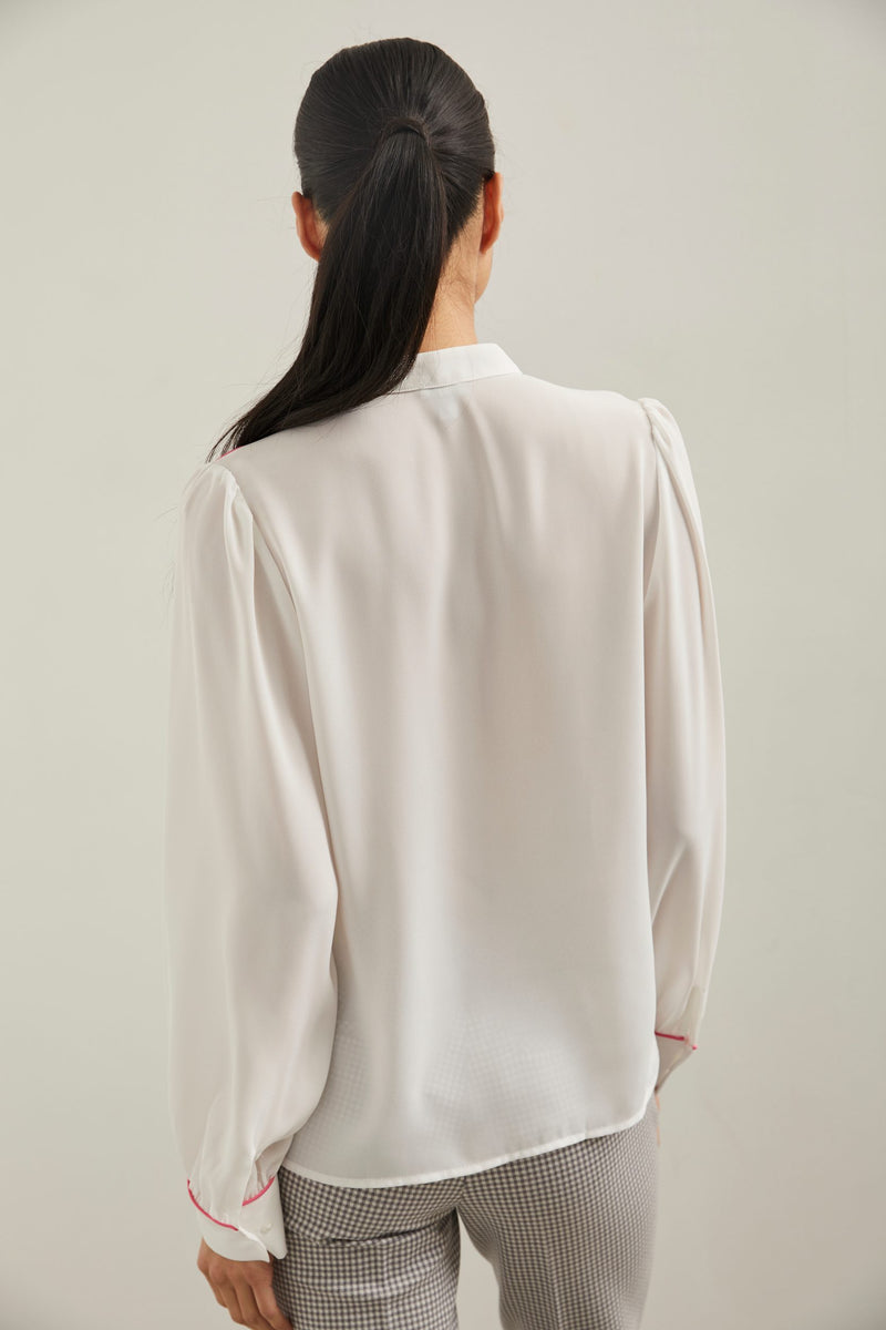 Puffy sleeve blouse with piping detail