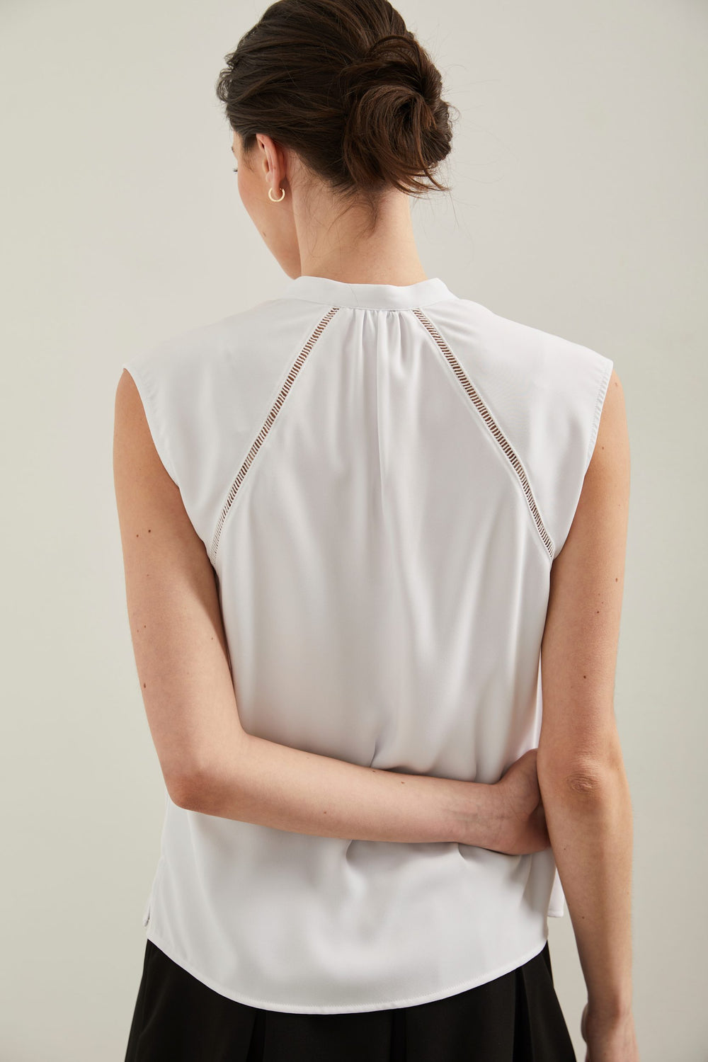 Sleeveless top with ribbon detail