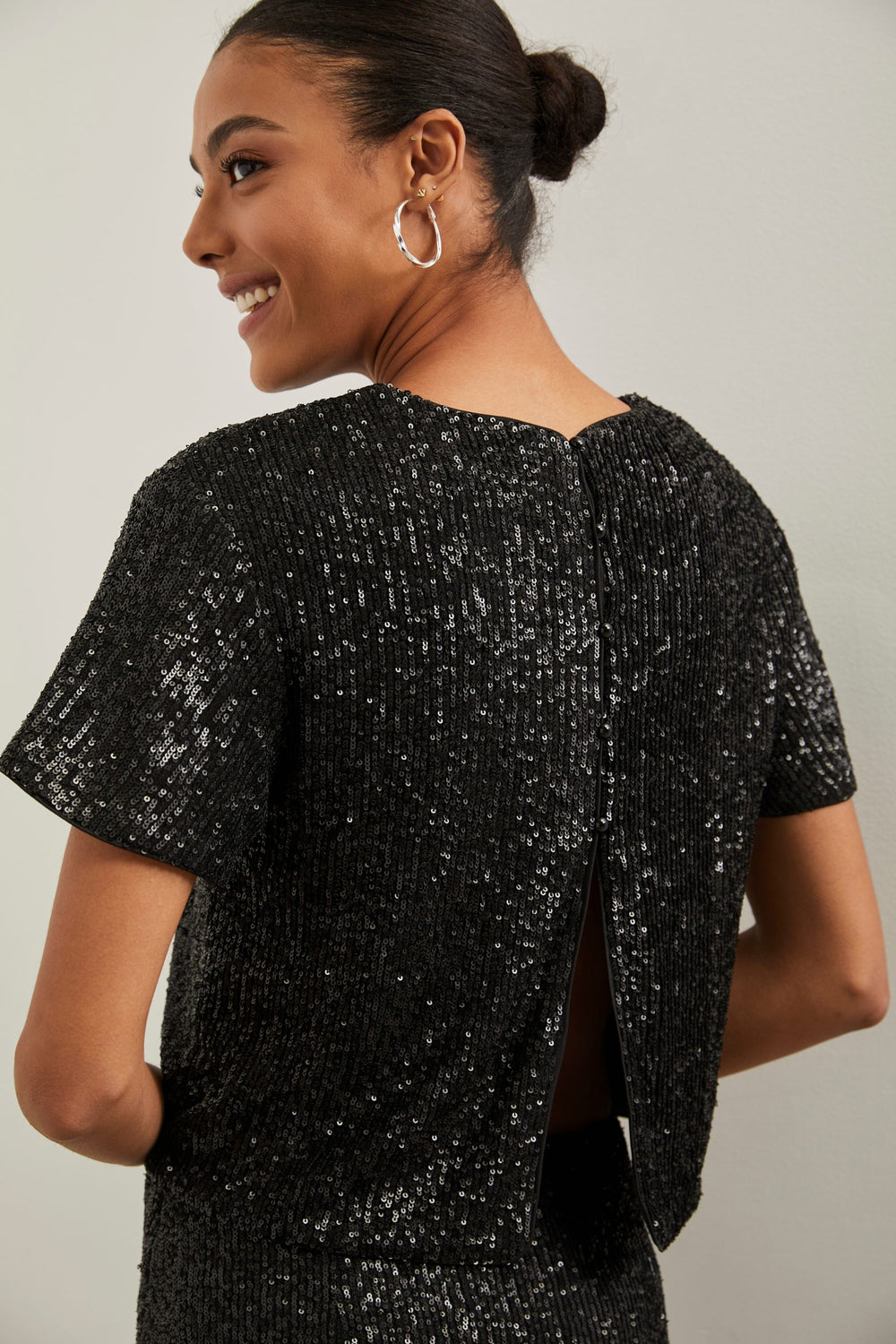 Open back sequin crop top