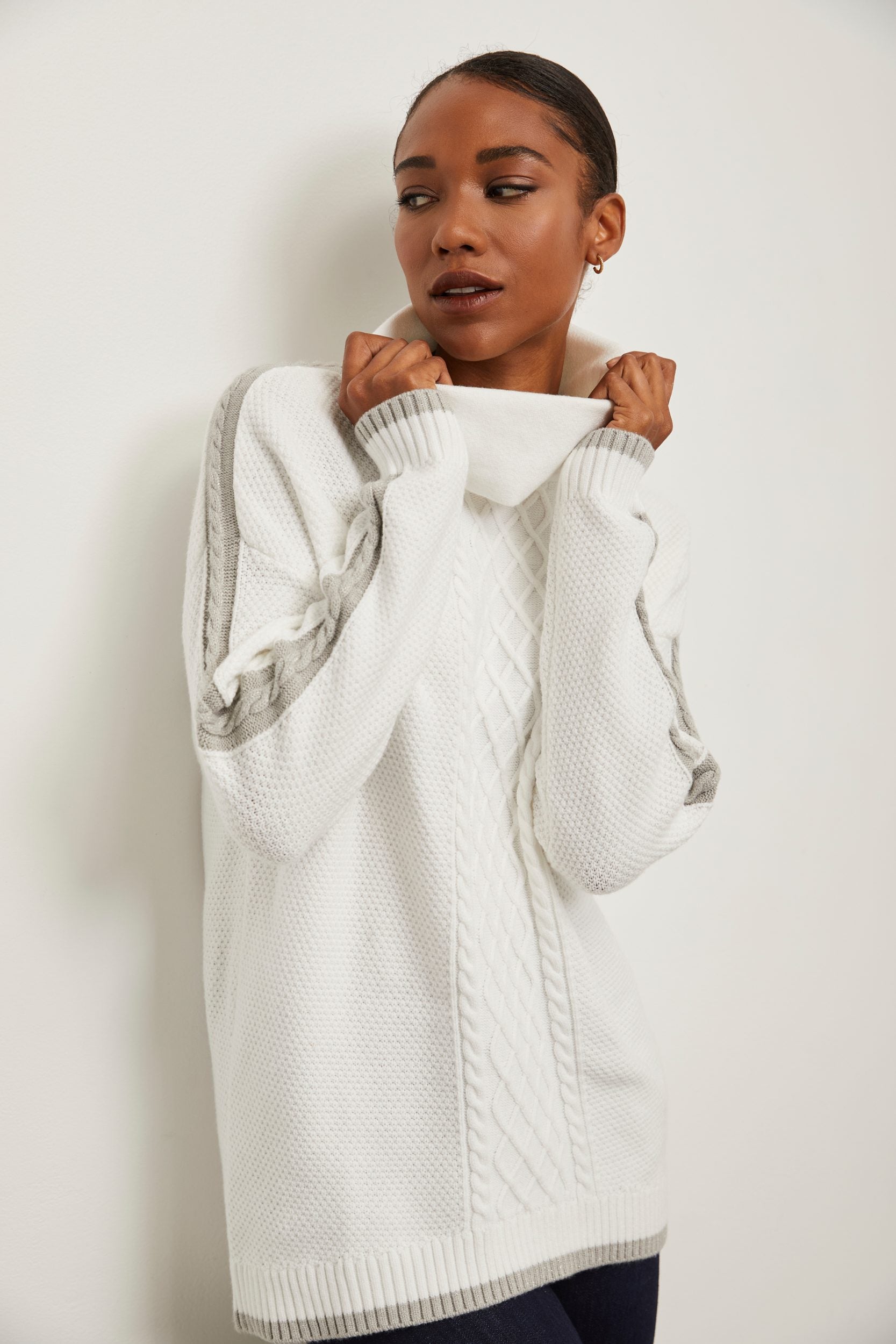 Oversized cable-knit sweater with wide collar