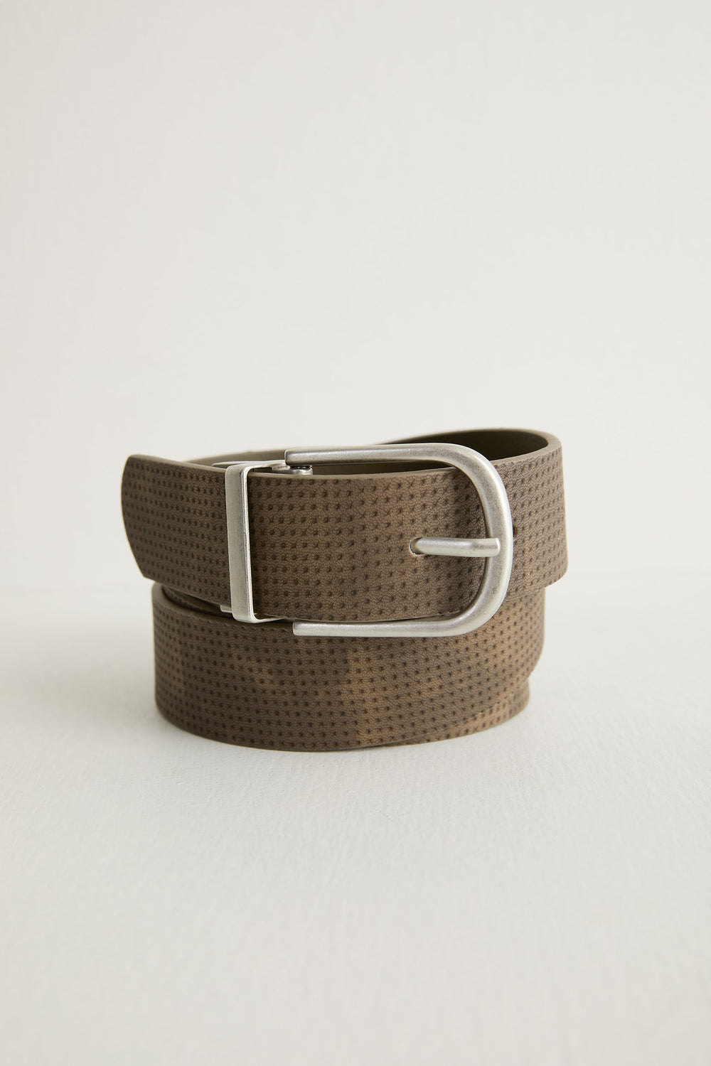 Perforated reversible belt